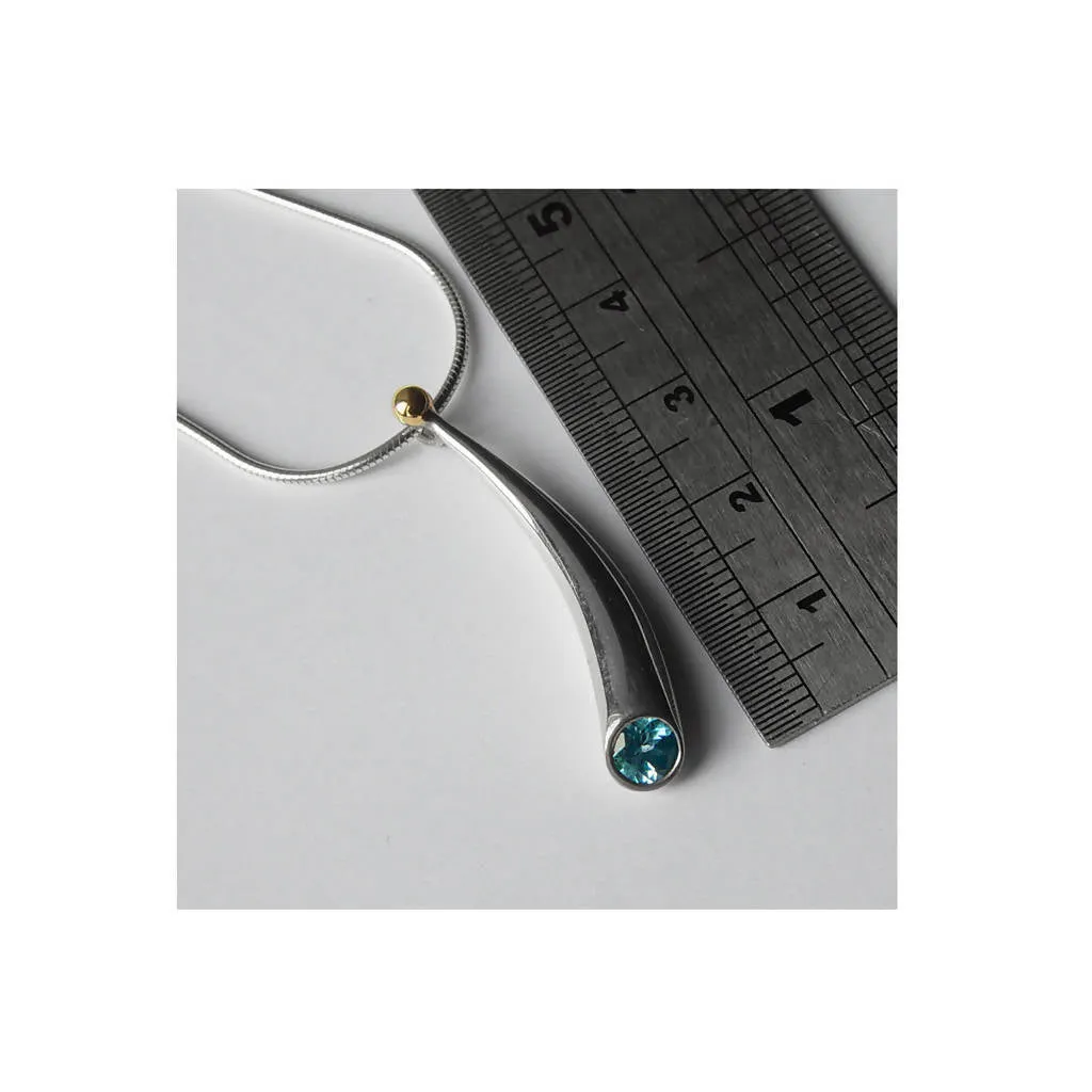 Short curved silver wiggly pendant with blue topaz & 18ct gold bead