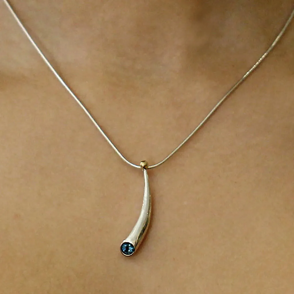 Short curved silver wiggly pendant with blue topaz & 18ct gold bead